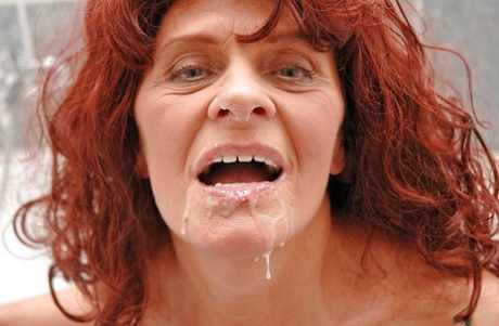 Lusty redhead granny sucks and fucks a hard cock in the bath 16771170